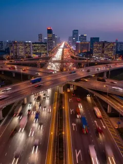 Modern highway interchange at dusk, symbolizing US infrastructure bill investments and future development.