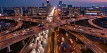 Modern highway interchange at dusk, symbolizing US infrastructure bill investments and future development.
